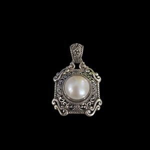 .925 artisian bali sterling silver and mauve pearl pendant